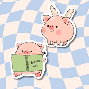 May include: Two pink pig stickers. One pig is reading a green book with the title "Charlotte's Web". The other pig has wings and is flying.