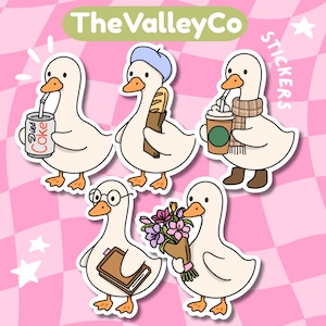 May include: A set of five die-cut stickers featuring white ducks with orange beaks and feet. One duck holds a Diet Coke can, one wears a blue beret with a baguette, one wears a scarf and boots with a coffee cup, one wears glasses with a book, and one holds flowers.