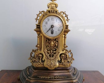 Vintage bronze table clock