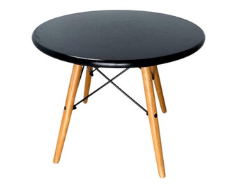 Scandinavian simplicity round black coffee table wooden legs Eiffel Style late 20c Sweden