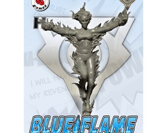 Puede incluir: Una figura en miniatura de plástico gris de una mujer con llamas alrededor de su cuerpo. La figura está en posición de brazos extendidos y está de pie sobre una base. El texto "BLUE FLAME" está impreso debajo de la figura.