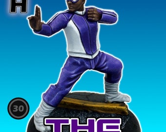 May include: A painted miniature figure of a person wearing a purple and white outfit, standing on a black base with a yellow stripe. The figure is in a fighting pose with one arm raised. The base has the text "THE MAVEN" in purple letters. The figure is labeled "H" and has a number "30" on a circle.