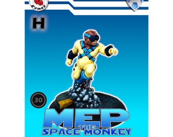 May include: A yellow and blue painted miniature figure of a space monkey wearing a helmet and goggles. The figure is standing on a rock base and is labeled "MEP THE SPACE MONKEY".