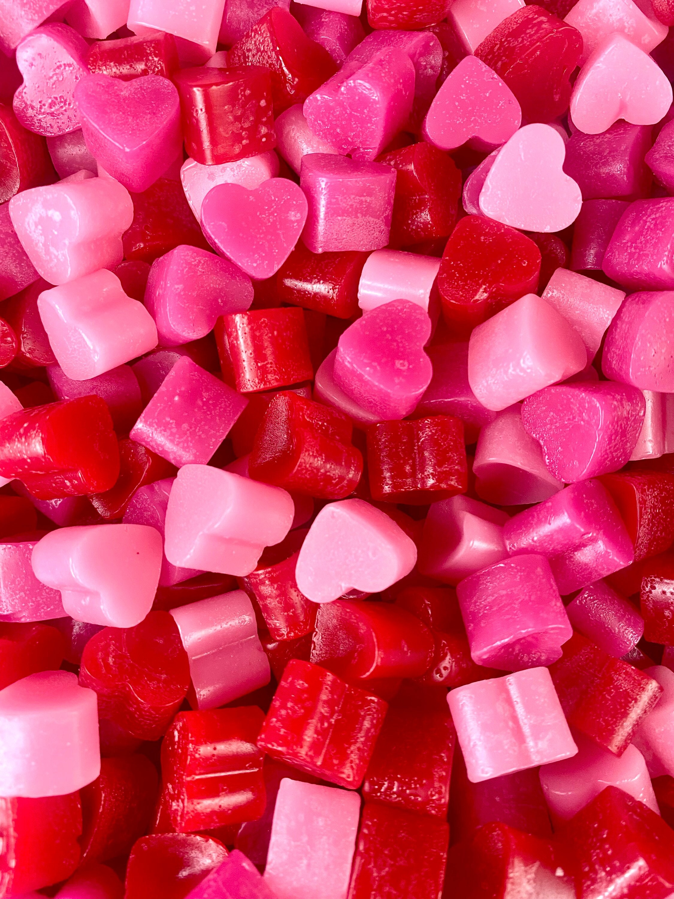 Pink heart shaped candles and rose Stock Photo by ©Subbotina 74125811