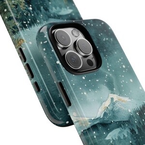 Phone case with watercolor snowy mountain forest scene at night in teal and green tones, aesthetic winter holiday gift for her