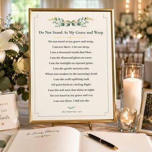 May include: A gold-framed sign featuring the poem Do Not Stand At My Grave and Weep by Clare Harner, displayed on a stand. The sign includes green leaf illustrations, a guest book with a pen, a small Forever in our Hearts sign, and a photo frame.