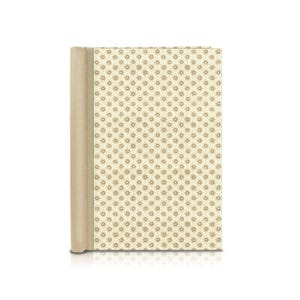 Könnte beinhalten: Ein cremefarbenes Notizbuch mit einem goldenen Glitzermuster und einem beigefarbenen Rücken.
