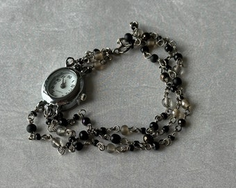 Reloj de pulsera único en negro y gris