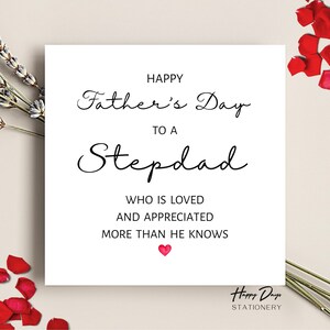 May include: A white card with black text that reads "Happy Father's Day to a Stepdad who is loved and appreciated more than he knows". A small red heart is below the text. The bottom of the card has the text "Happy Days Stationery".
