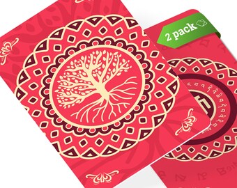 May include: Two red cards with a mandala design featuring a tree of life in the center. The cards have the text "2 pack" on a green tag.