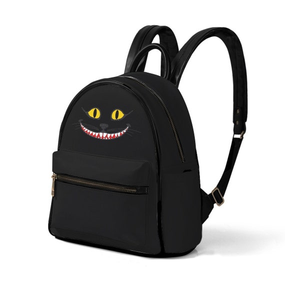 addison small pebbled leather backpack Mina Baie Addison Crossbody Leather in Black / Gold