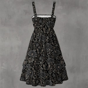 May include: A black sleeveless dress featuring a repeating pattern of grey roses, butterflies, and small skulls on a dark background. The dress has a square neckline with thin shoulder straps and a tiered skirt design that flares toward the hem.