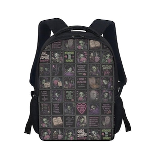 May include: Black backpack with a grid pattern featuring zombie-themed illustrations and text. The text includes phrases like "Girl Zombie Introvert," "Introvert Till I'm Hungry," and "My Social Battery is Dead." The backpack has adjustable straps and side pockets.