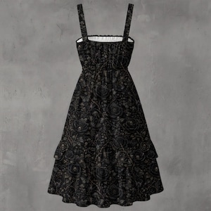 May include: A black midi dress featuring a square neckline, thick shoulder straps, and a smocked bodice. The fabric is adorned with an intricate, repeating pattern of dark roses, thorny vines, and small skulls throughout the entire garment.