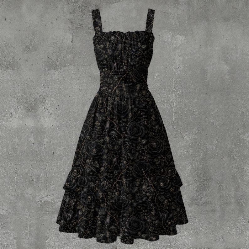 May include: A black sleeveless dress featuring a square neckline and a fitted bodice with a gathered waist. The fabric is adorned with an intricate pattern of dark roses, thorny vines, and small skulls. The skirt has a tiered, flared silhouette.