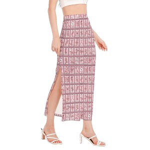 May include: A pink maxi skirt with a high waist and a side slit. The skirt features a repeating pattern of small squares with Chinese zodiac symbols.