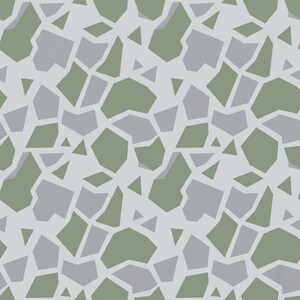 May include: A seamless pattern featuring a repeating design of irregular geometric shapes. The pattern includes shades of gray and olive green on a light gray background. Triangles and polygon shapes are scattered throughout the design.