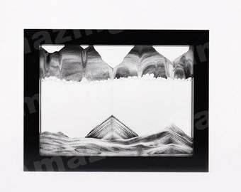 Arte con arena en movimiento – Yin-Yang