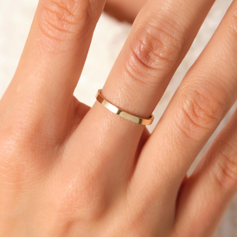 Here is plain wedding band 14K solid gold ring and flat wedding band. Our 18K rose gold band or woman wedding bands will be perfect gift for your engagement, wedding or anniversary ceremony! If you re looking for classic wedding band and simple wedding ring. Here is custom engrave band and summer wedding band for yourself. Discover our comfort fit 10K band and personalized gifts.