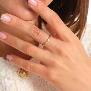 Here is plain wedding band 14K solid gold ring and flat wedding band. Our 18K rose gold band or woman wedding bands will be perfect gift for your engagement, wedding or anniversary ceremony! If you re looking for classic wedding band and simple wedding ring. Here is custom engrave band and summer wedding band for yourself. Discover our comfort fit 10K band and personalized gifts.