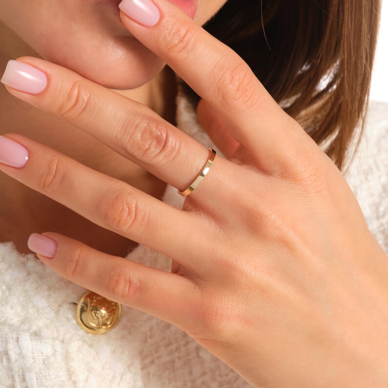 Here is plain wedding band 14K solid gold ring and flat wedding band. Our 18K rose gold band or woman wedding bands will be perfect gift for your engagement, wedding or anniversary ceremony! If you re looking for classic wedding band and simple wedding ring. Here is custom engrave band and summer wedding band for yourself. Discover our comfort fit 10K band and personalized gifts.