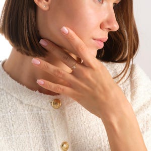 💎 Diamond Dangle Ring – Minimalist 14K Solid Gold Gift for Her
Add effortless sparkle to your everyday style with this diamond dangle ring – a dainty and elegant piece crafted in your choice of 10K, 14K, or 18K solid gold. Featuring a single round-cut diamond or moissanite, this delicate dangling diamond ring brings movement, brilliance, and charm to any look.

Perfect for women who love minimalist jewelry, this handmade gold ring makes a beautiful statement whether worn alone or stacked.