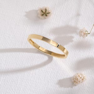 Here is plain wedding band 14K solid gold ring and flat wedding band. Our 18K rose gold band or woman wedding bands will be perfect gift for your engagement, wedding or anniversary ceremony! If you re looking for classic wedding band and simple wedding ring. Here is custom engrave band and summer wedding band for yourself. Discover our comfort fit 10K band and personalized gifts.