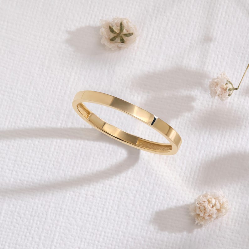 Here is plain wedding band 14K solid gold ring and flat wedding band. Our 18K rose gold band or woman wedding bands will be perfect gift for your engagement, wedding or anniversary ceremony! If you re looking for classic wedding band and simple wedding ring. Here is custom engrave band and summer wedding band for yourself. Discover our comfort fit 10K band and personalized gifts.