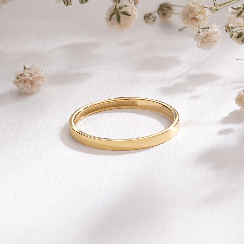 Here is plain wedding band 14K solid gold ring and flat wedding band. Our 18K rose gold band or woman wedding bands will be perfect gift for your engagement, wedding or anniversary ceremony! If you re looking for classic wedding band and simple wedding ring. Here is custom engrave band and summer wedding band for yourself. Discover our comfort fit 10K band and personalized gifts.