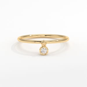 💎 Diamond Dangle Ring – Minimalist 14K Solid Gold Gift for Her
Add effortless sparkle to your everyday style with this diamond dangle ring – a dainty and elegant piece crafted in your choice of 10K, 14K, or 18K solid gold. Featuring a single round-cut diamond or moissanite, this delicate dangling diamond ring brings movement, brilliance, and charm to any look.

Perfect for women who love minimalist jewelry, this handmade gold ring makes a beautiful statement whether worn alone or stacked.