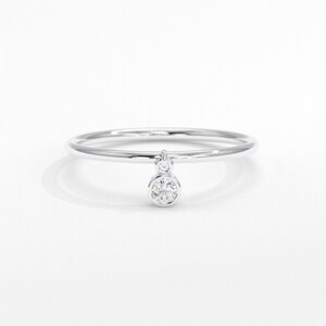 💎 Diamond Dangle Ring – Minimalist 14K Solid Gold Gift for Her
Add effortless sparkle to your everyday style with this diamond dangle ring – a dainty and elegant piece crafted in your choice of 10K, 14K, or 18K solid gold. Featuring a single round-cut diamond or moissanite, this delicate dangling diamond ring brings movement, brilliance, and charm to any look.

Perfect for women who love minimalist jewelry, this handmade gold ring makes a beautiful statement whether worn alone or stacked.