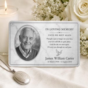 May include: A rectangular memorial card with a white marble texture featuring a black and white portrait of an older man, the text IN LOVING MEMORY, a poem, the name James William Carter, and the dates 12 March 1948 to 6 August 2024.