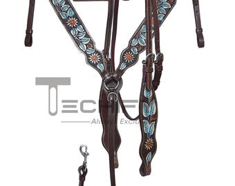 Conjunto de arreos de caballo western de cuero pintado con motivos florales: cabezada y pechera trabajadas a mano.