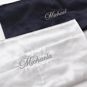 Personalized Satin Pillowcases for Couples or Loved Ones

Elegant satin pillowcases personalized with embroidered names, perfect for couples, siblings, or loved ones who want to add a special touch to their space. The soft satin fabric and delicate embroidery create a meaningful and stylish keepsake that celebrates connection and shared moments.