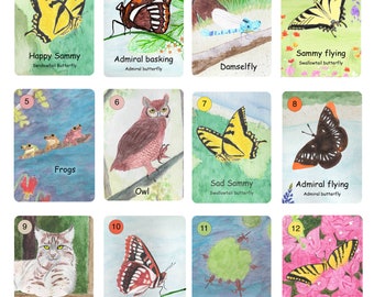 May include: A set of 12 illustrated cards featuring various animals and insects, including a swallowtail butterfly, an owl, a bobcat, a dragonfly, frogs, tadpoles, and an admiral butterfly. Each card has a number and a title.
