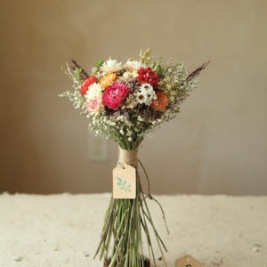 This is variation F of the listing in a size Petite Full with a mix of pastel pink, orange, red and white strawflowers, daisies, and  mixed wildflowers and grasses. Perfect for a vase, bridesmaid proposal, flower girl.  mother's day, wedding table and home decor.