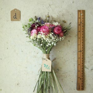This photo features variation D entitled "Yarrow Mix". This bouquet features burgundy, pink and creamy white strawflowers, daisies, eucalyptus and wildflowers and wild grasses. Bridesmaid and wedding decor, wildflowers for a vase and birthday, bridesmaid proposal, flower girl bouquets.