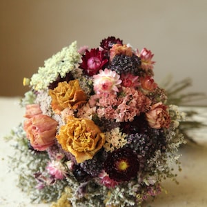 Custom informational listing for Wildflower Wedding dried flower bouquets, sizes and pricing. This listing gives details regarding what is available in a custom order and how to set it up with my shop. Dried Flower Bridal and Bridesmaid Bouquets, flower girl bouquets, Boutonnieres, pocket squares, corsages, flowers crowns, hairpins and hair combs, and custom dried flower table arrangements. Contact me directly in order to set up a custom order.