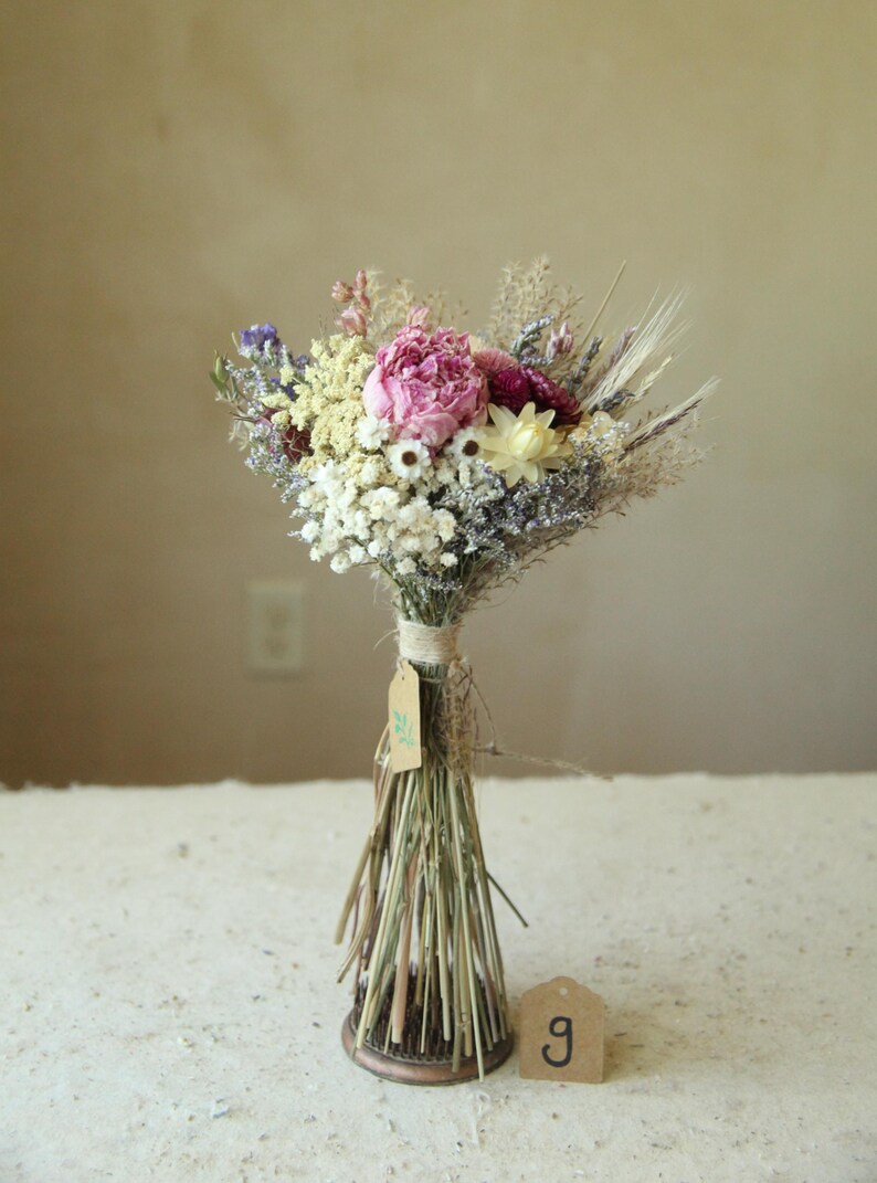 This photo features variation G of the listing, with  a pink peony, daisies, strawflowers and wildflowers. Naturally air dried bridesmaid, bridal and home decor. Biodiverse and organically grown flowers.
