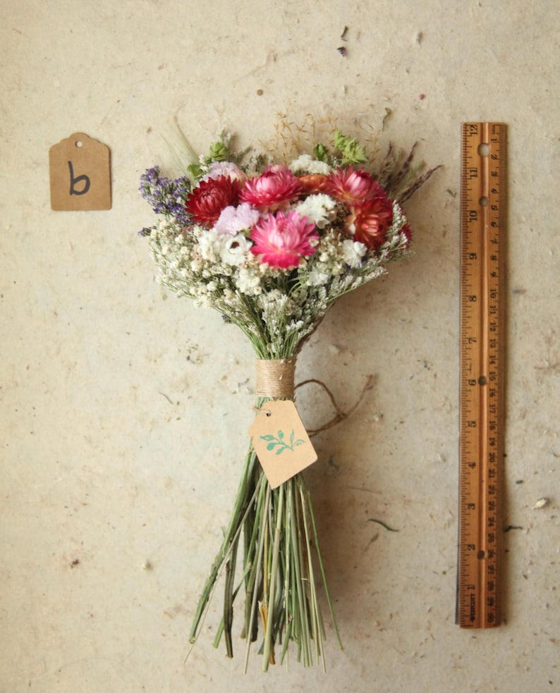 This photo features variation B of the listing, entitled Boho Mix. a bouquet containing a mix of red, bright and deep pink and blush strawflowers, daisies, baby's breath and wildflowers. Boho home and wedding decor. Mother's Day florals, one of a kind seasonal home and wedding decor.