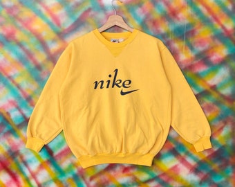 pastel yellow nike jumper