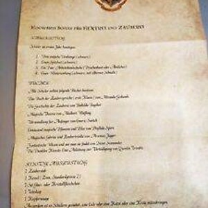 May include: A list of required items for a student attending Hogwarts School of Witchcraft and Wizardry. The list includes items such as a wand, robes, cauldron, and a telescope. The list is written in a handwritten font on a parchment background with the Hogwarts crest at the top.