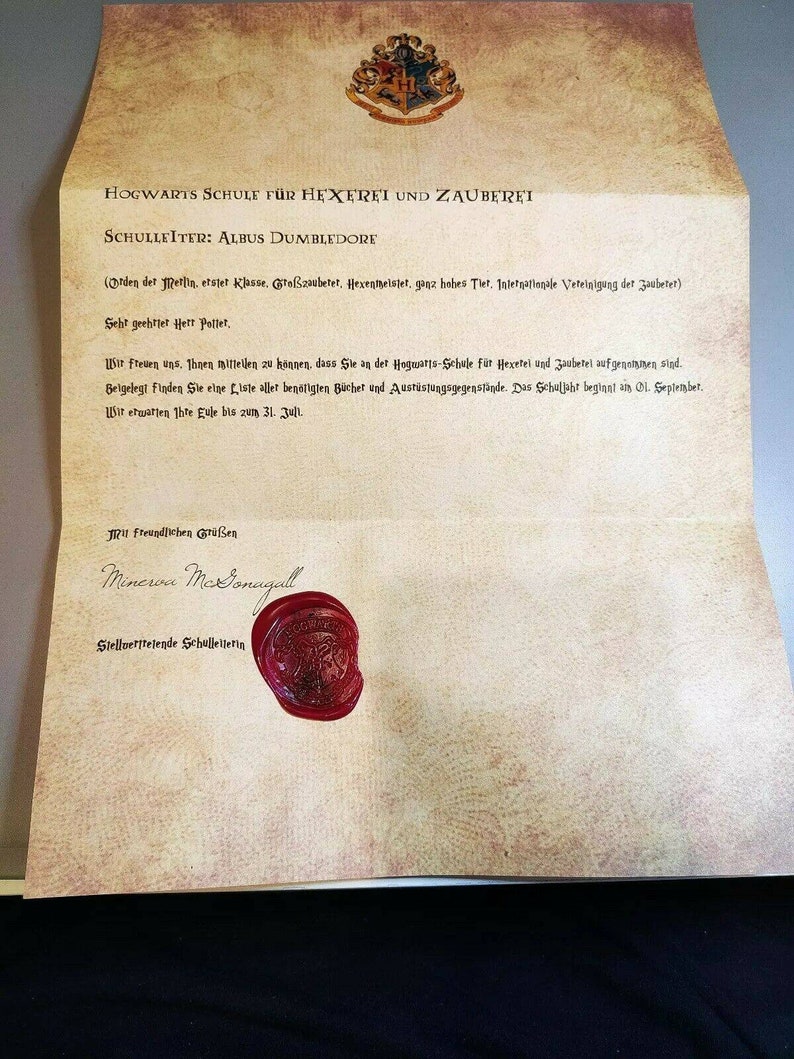 May include: A Hogwarts School of Witchcraft and Wizardry acceptance letter with a red wax seal. The letter is addressed to "Mr. Potter" and signed by "Minerva McGonagall, Deputy Headmistress".