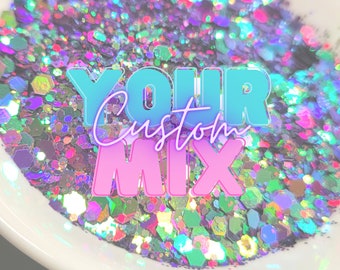 May include: A close-up of a bowl filled with iridescent glitter in various colours, including pink, blue, green, and purple. The glitter is labelled "YOUR Custom MIX".