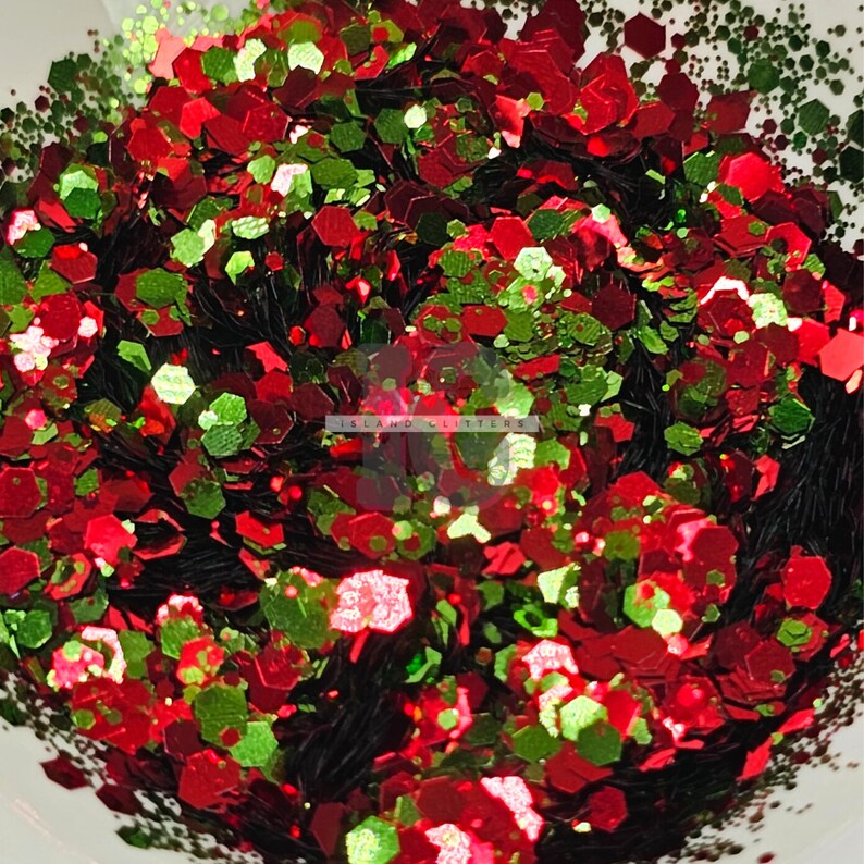May include: Red, green and black glitter mix. This is a close-up of the glitter, which is perfect for crafting and decorating.