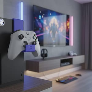 Op de afbeelding: Een set van drie keramische mokken met een gespikkelde, matte afwerking. De mokken zijn in de kleuren crème, lichtgrijs en donkergrijs. Elke mok heeft een eenvoudig, minimalistisch ontwerp en een afgerond handvat.