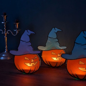 不気味なハロウィーンパーティーの雰囲気を演出するティーライトホルダー付きハロウィーンカボチャの装飾、不気味な光で素晴らしいギフトアイデア