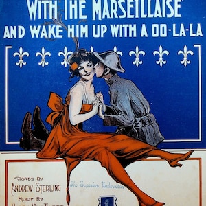 May include: A vintage sheet music cover with a blue background and a couple in a romantic embrace. The woman is wearing a red dress and the man is wearing a military uniform. The title of the song is "You'll Have To Put Him To Sleep With The Marseillaise And Wake Him Up With A Doo-La-La".