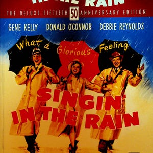 Singin in the Rain PVC Songbook Gene Kelly Donald O&#39;Connor Debbie Reynolds