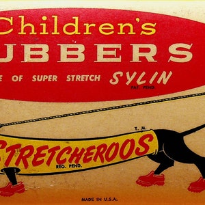 May include: A vintage box of Children's Rubbers, made of Super Stretch Sylin. The box features a cartoon illustration of a dachshund wearing red rubber boots and being walked by a child in a yellow raincoat. The text on the box reads "Children's Rubbers, Made of Super Stretch Sylin, T.M. Stretcheroos, Reg. Pend., Made in U.S.A."